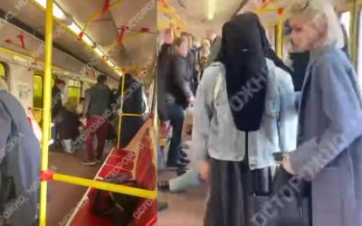 Wanita Rusia Buka Paksa Niqab Muslimah di Metro, Suaminya Berikan Perlawanan